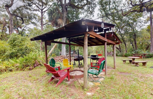 2 riverfront cabins with large yard, grill, firepit, canoe, & private W/D