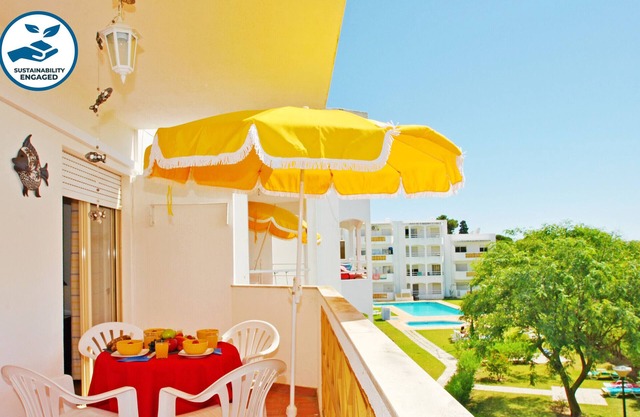 2BR w/Pool & Balcony, 10min Walk to Oura Beach