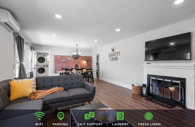 3-Bed Retreat with Spa-Like Bath, Well-Equipped Kitchen, Laundry On-Site, and Reserved Parking.