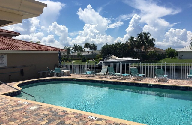 3 Bedroom 2nd story canal front condo across street from Fishermans Village