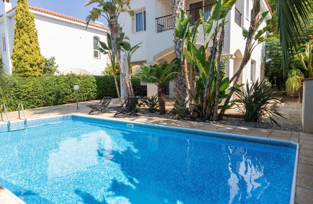 3 bedroom villa with a private pool and within 5 minute walk to the Beach!