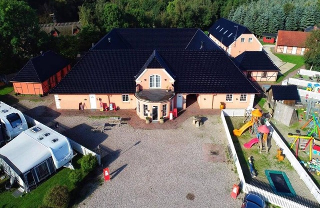 4 person holiday park home in Graested