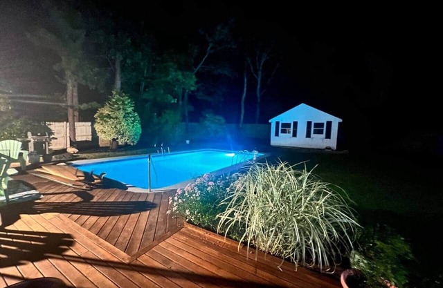 5-bedroom Cape with a pool and yard games.