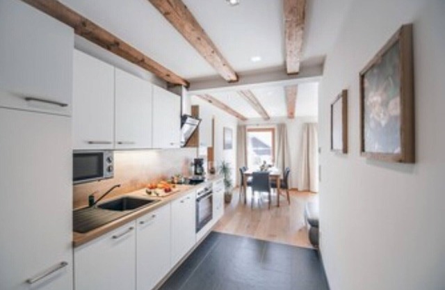 60 m² modern vacation apartment with balcony, free bathing lake, 100 m to the ski area