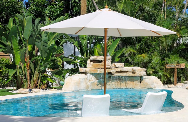 A beautifully renovated private home with a large backyard, Pool, and Hot Tub