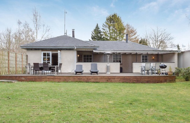 A beautifully stylish cottage, decorated in light colors and furnished in a modern style.