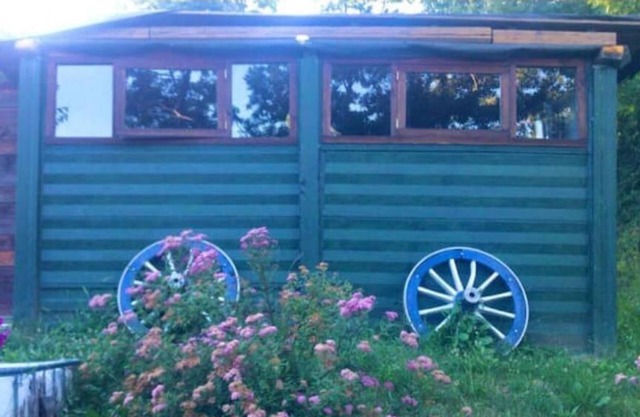 A cute colourful Glamping cabin with a bohemian theme.