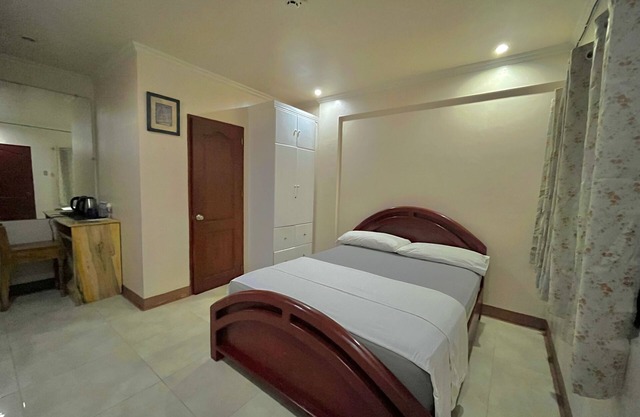 A peaceful beachfront resort with a home-like feel offering sea views.