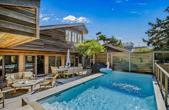 A slice of paradise 1 block to beach with private pool, 3 decks, modern interior