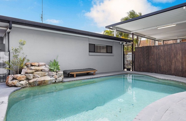 A Tranquil Sunshine Escape with Pool and Deck