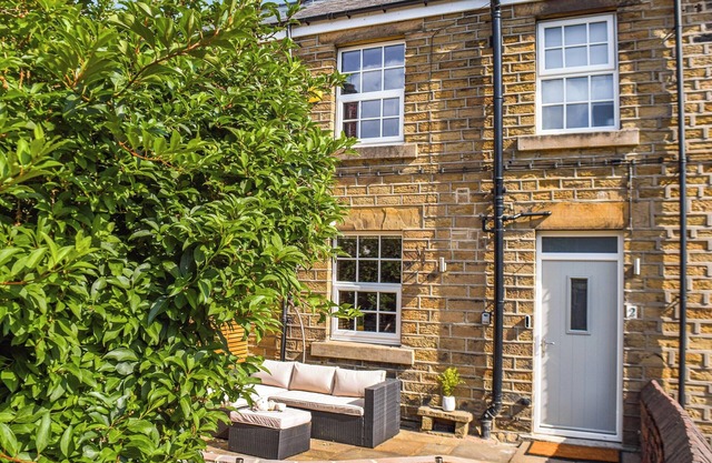 A wonderful stone built cottage located on a quiet row in Clayton West.