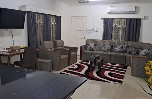 ABM Court Apt 1. Very neat and spacious. Cosy and private 2BR whole apartment