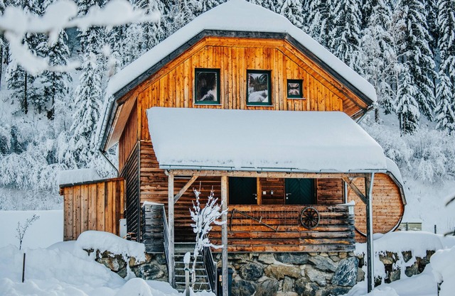 Alpine house with a unique barrel sauna