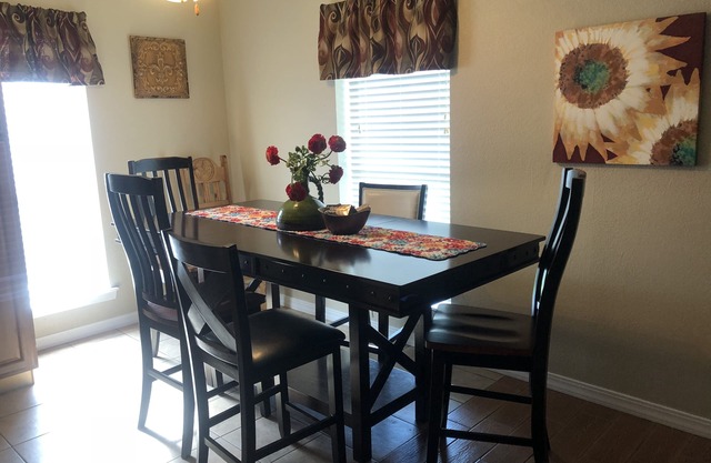 All the Comforts of Home Duplex. Backyard grill and atmosphere. Extra services!