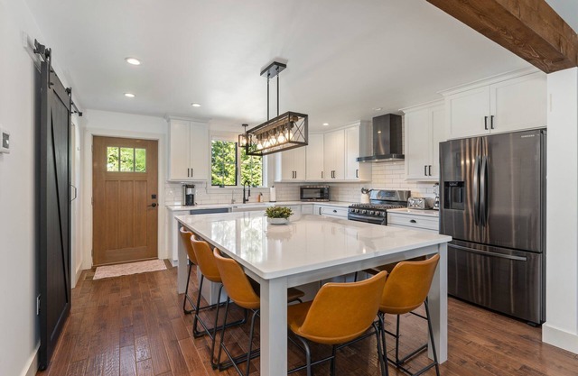 Amazing new construction in this beautiful home, walk to Rodger Wheeler Beach.