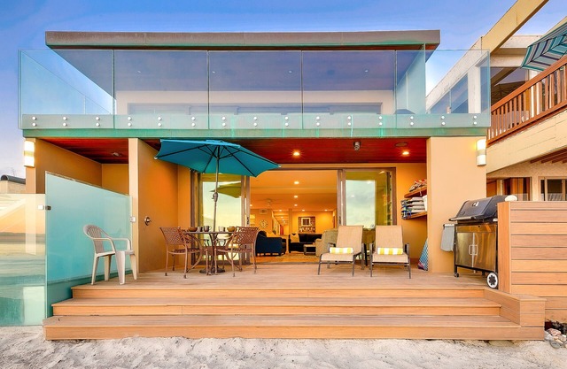 Amazing oceanfront home with inviting deck, privacy, & outdoor living