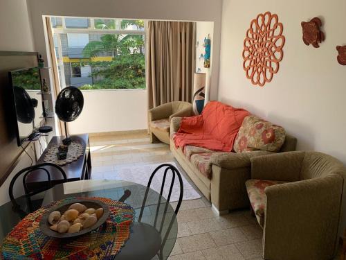 Apartamento Praia das Astúrias, 2 minutos de caminhada para praia, piscina, garagem demarcada
