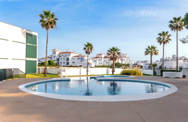 Apartment 'Cala´n Bosch Planta Bj' with Shared Pool, Private Terrace and Air Conditioning
