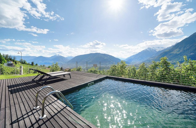 Apartment 'Dahoam - Gardensuite L' with Mountain View, Shared Pool and Wi-Fi