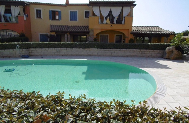 Apartment 'La Pineta' with Shared Pool, Private Terrace and Air Conditioning