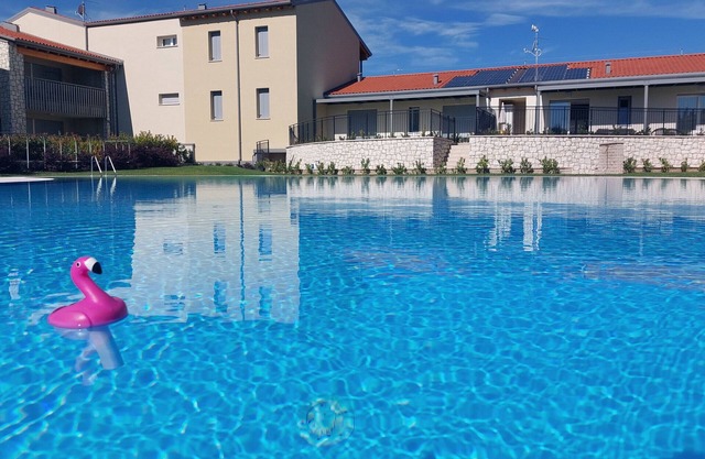 Apartment 'New Casa Augusto' with Shared Pool, Wi-Fi and Air Conditioning