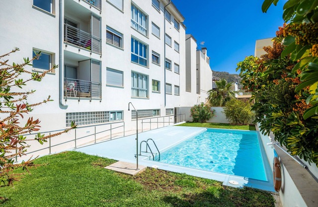 Apartment 'Pollentia Mar' with Shared Pool, Wi-Fi and Air Conditioning