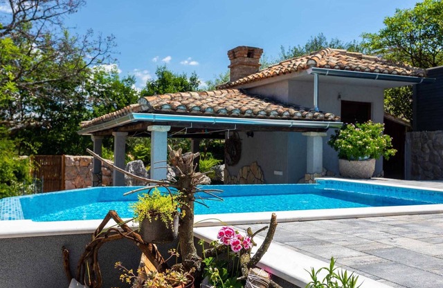 Apartment Roko with a private Swimming pool and stone grill