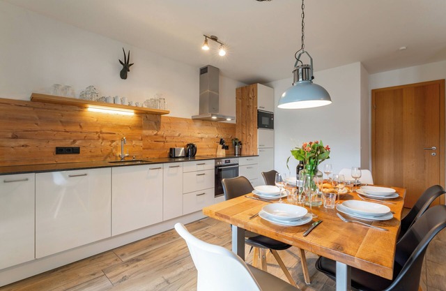 Apartment with a shared sauna and a gym