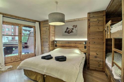 ARC 1950, Appartement 6 couchages, Exposition Ouest, Vue Col des Frêtes, Sauna Hammam Jacuzzi Piscine Vue MontBlanc