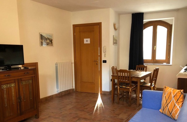 Attractive 1 bedroom apartment with fireplace and private terrace
