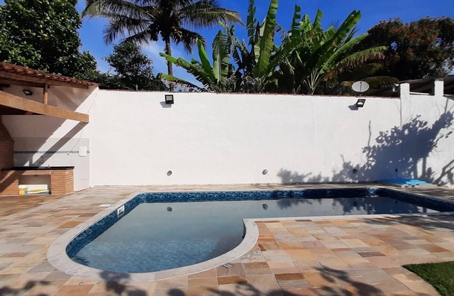 Beach house with pool and barbecue.