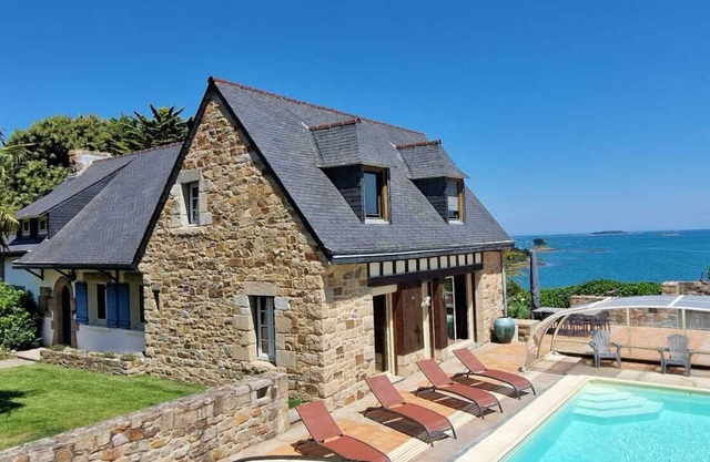 Beach view villa at the end of the garden covered swimming pool heated all year round