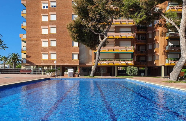 Beachfront Apartment with 4 Pools, Terrace, and Parking in Torredembarra