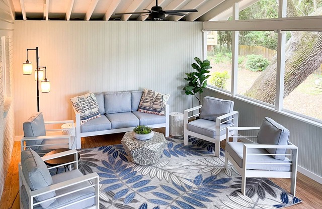 Beachy haven with a beautiful screened in porch and big yard