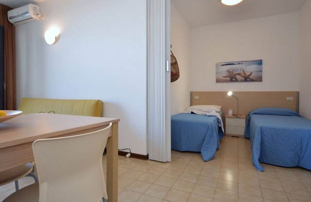 Beautiful apartment for 4 guests with A/C, pool, TV, terrace and pets allowed