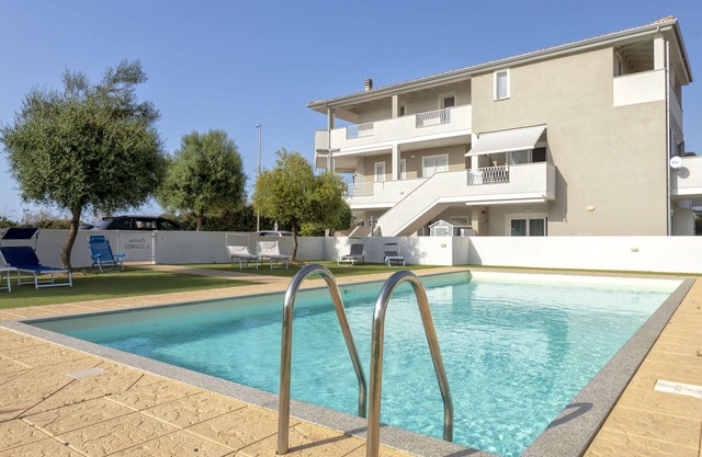 Beautiful apartment for 5 people with A/C, WIFI, pool, TV, terrace and parking