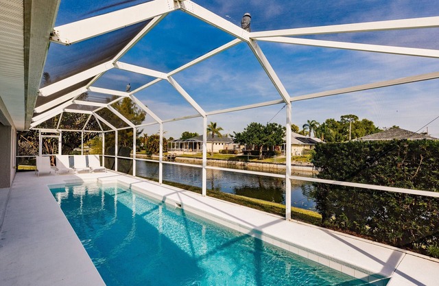 Beautiful Cape Coral Home, Outdoor Oasis with Heated Pool on a Freshwater Canal!