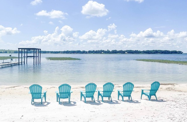 Beautiful home with white sand beach on stunning Crooked Lake