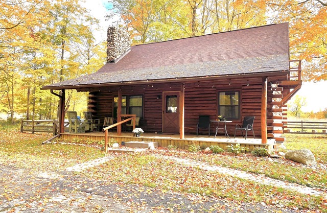 Beautiful log cabin with all the creature comforts of home. Private fishing lake