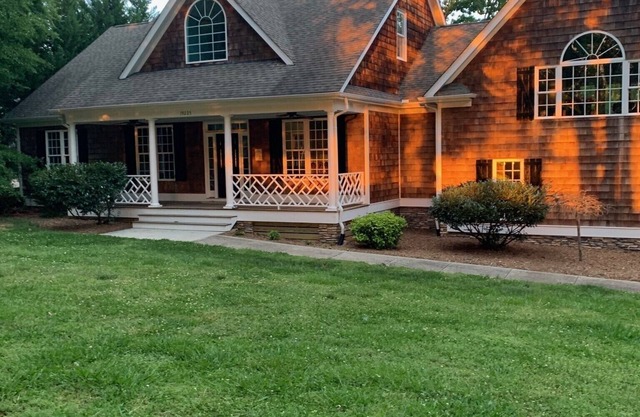 Beautiful waterfront! Large patio and covered porch. Dock, Fire pit, Game room