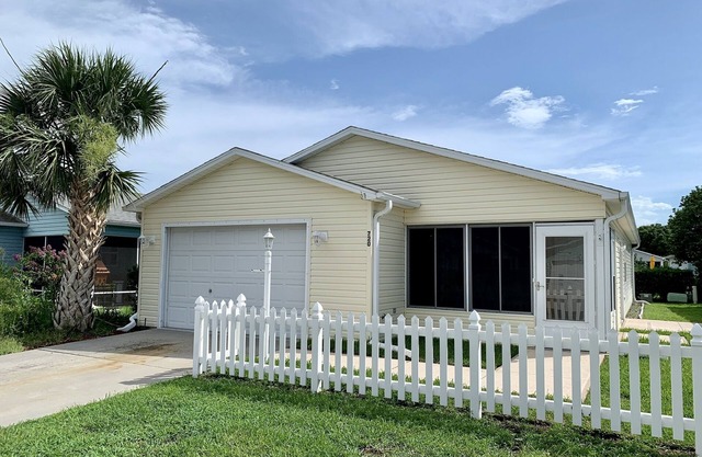 Beautifully updated and close to everything! Yamaha gas cart included!