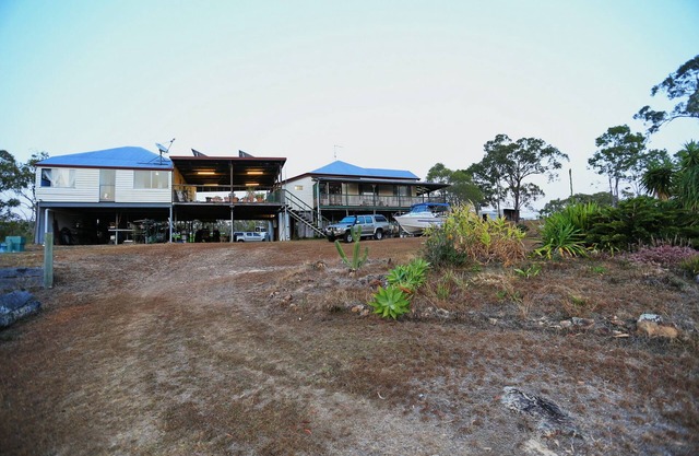 Big inviting Queenslander overlooking the bay with sea breezes and water views