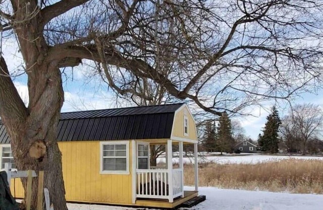 Blue Door Guest House, a tiny rustic haven on the edge of a big field. Pets <3!