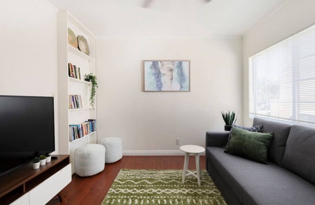 Bohemian Inspired Home: with a Roomy Queen Bed, High-Speed Internet, Your Own Patio, and On-Site Laundry.