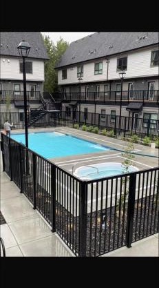 Brand New 2BR Condo with Outdoor Swimming Pool and Hot Tub