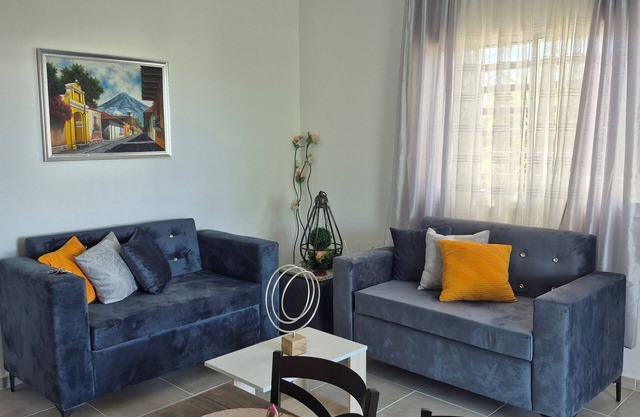 Breezy 2-bedroom apartment in a quiet Nagua Suburb with AC and private parking