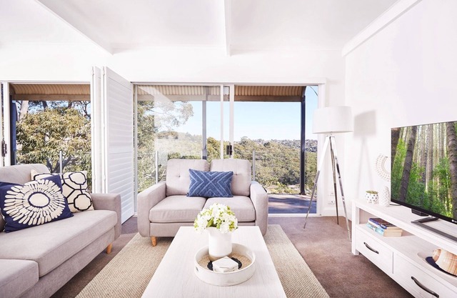 Bright And Spacious Family Home With Leafy Deck