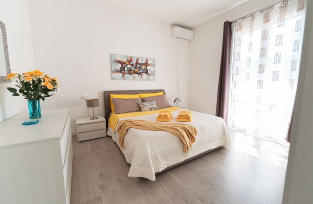 Bright two-room apartment with private terrace and garden
