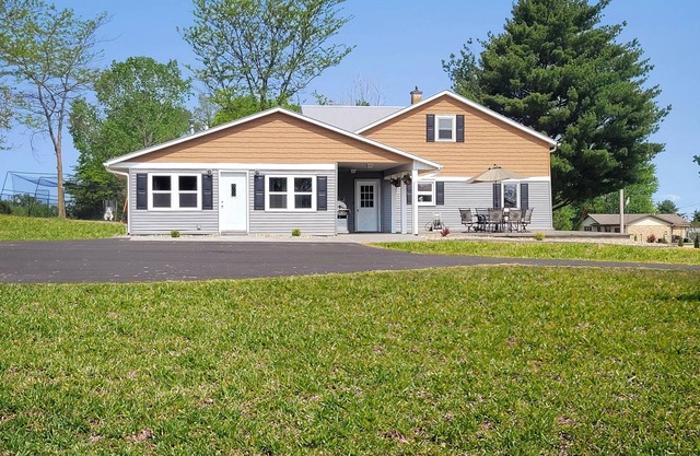 Bring the whole family to this great home with an acre of room for fun.