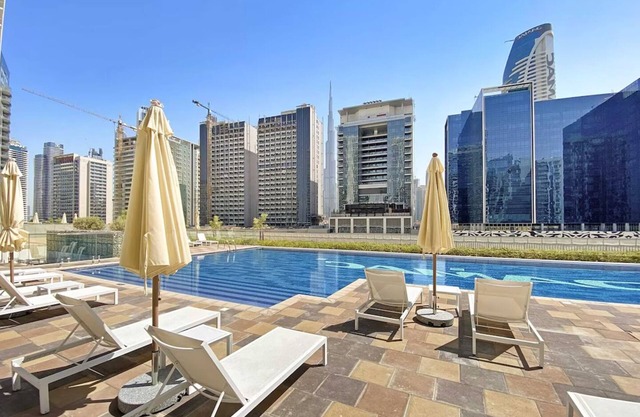 Burj Khalifa View! Modern 2BR in Dubai's Business Bay - waterfront canal
